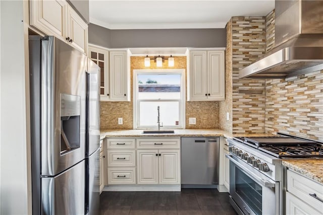 kitchen featuring a sink, ornamental molding, appliances with stainless steel finishes, dark wood-style floors, and wall chimney exhaust hood