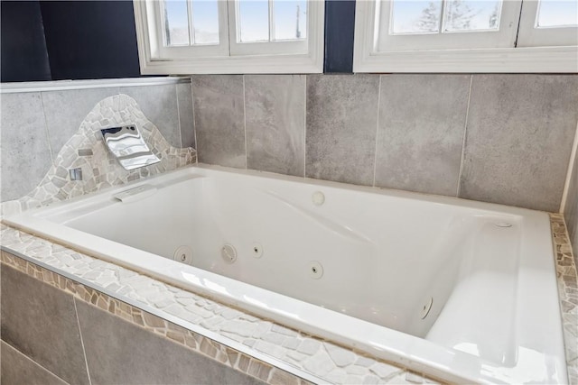 bathroom with a jetted tub