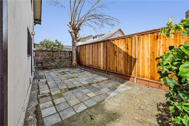 view of patio with a fenced backyard