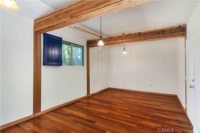 2749 E 17th St, Oakland, CA 94601 - empty room featuring wood finished floors and beam ceiling