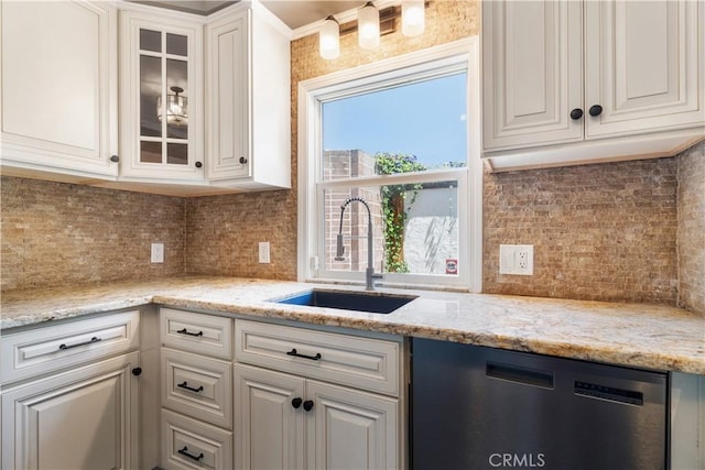2749 E 17th St, Oakland, CA 94601 - kitchen featuring stainless steel dishwasher, decorative backsplash, glass insert cabinets, and white cabinetry