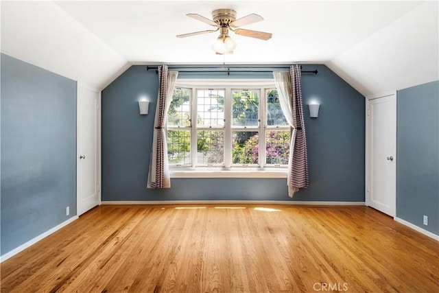 2749 E 17th St, Oakland, CA 94601 - additional living space with vaulted ceiling, wood finished floors, and a ceiling fan