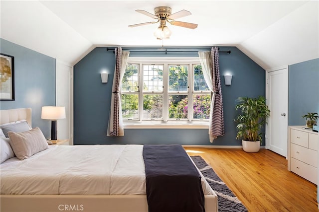 2749 E 17th St, Oakland, CA 94601 - bedroom with lofted ceiling, wood finished floors, and a ceiling fan