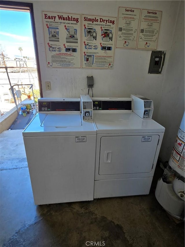 shared laundry area with washing machine and dryer