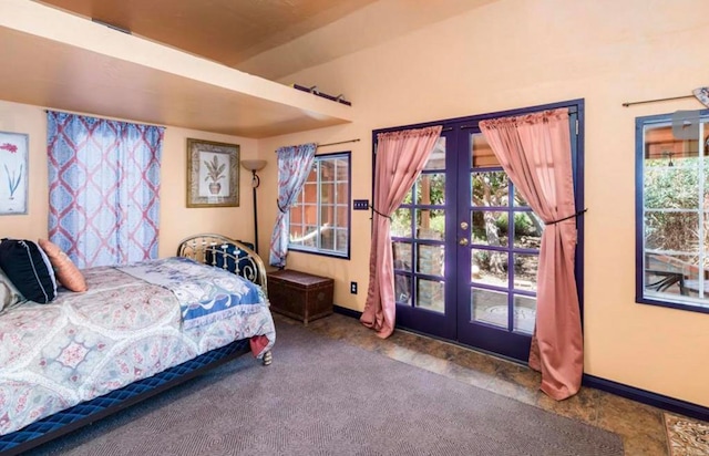 bedroom featuring carpet floors, french doors, and baseboards