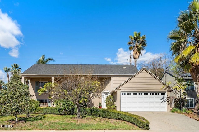 view of front facade with a garage and driveway