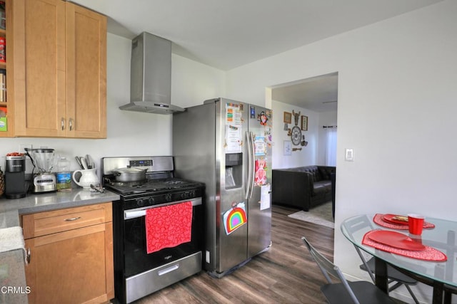 kitchen with wall chimney exhaust hood, appliances with stainless steel finishes, and dark wood-style flooring