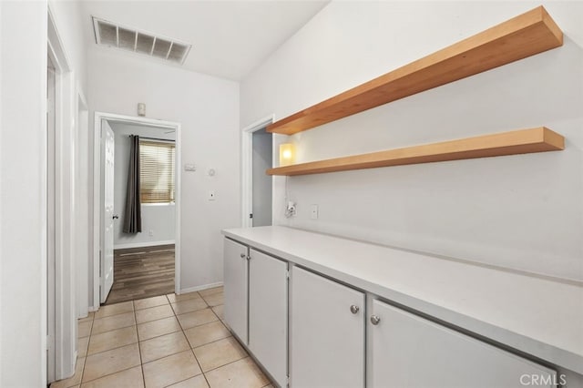 41211 Crooked Stick Dr, Temecula, CA 92591 - bar with light tile patterned floors and baseboards