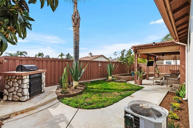 view of yard with central AC, a patio, and a fenced backyard