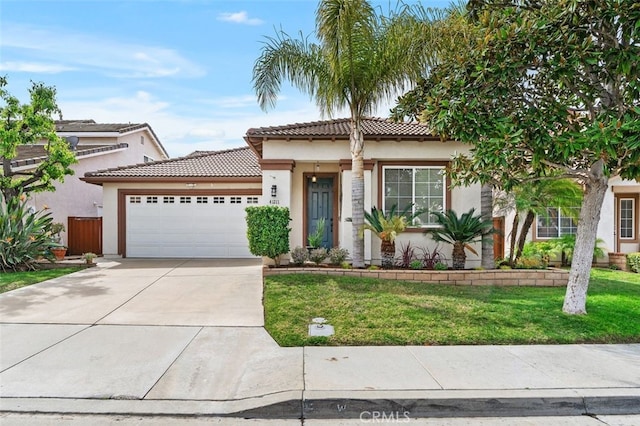 41211 Crooked Stick Dr, Temecula, CA 92591 - mediterranean / spanish-style house featuring stucco siding, a garage, concrete driveway, and a front yard