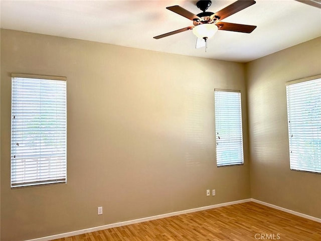41211 Crooked Stick Dr, Temecula, CA 92591 - unfurnished room featuring light wood-style floors, a ceiling fan, and baseboards