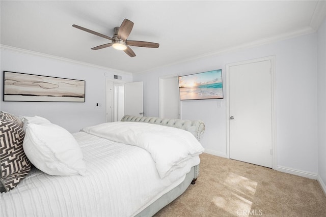 bedroom featuring carpet flooring, a ceiling fan, visible vents, baseboards, and ornamental molding