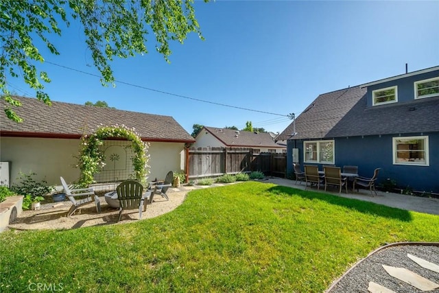 view of yard featuring a patio and fence