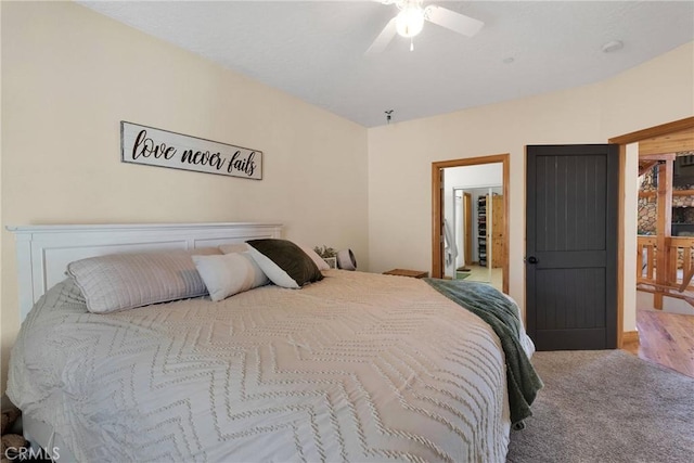 carpeted bedroom with a ceiling fan