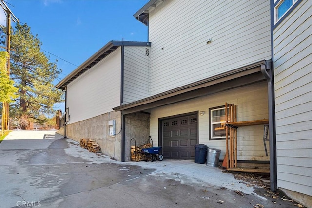 view of home's exterior with an attached garage