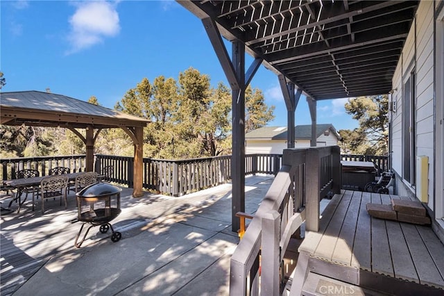 wooden deck featuring outdoor dining area