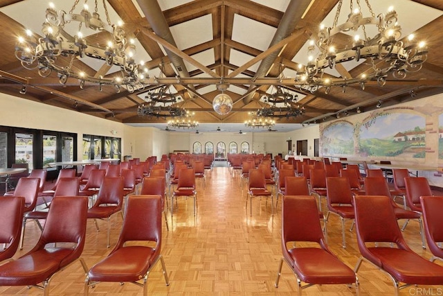 cinema with beamed ceiling and high vaulted ceiling