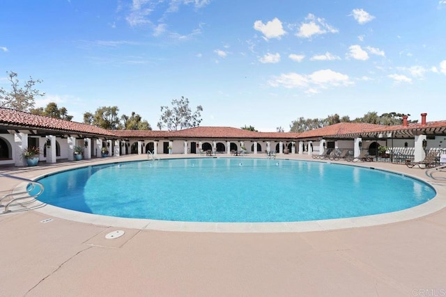 pool featuring a patio