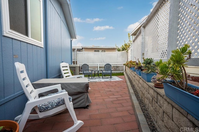 view of patio / terrace with fence