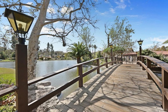 deck featuring a water view