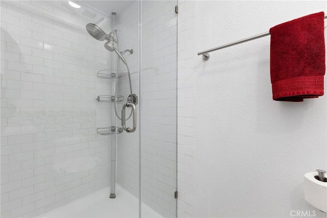 full bathroom with a stall shower