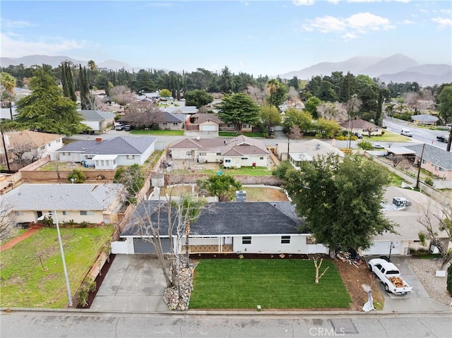 bird's eye view featuring a residential view and a mountain view