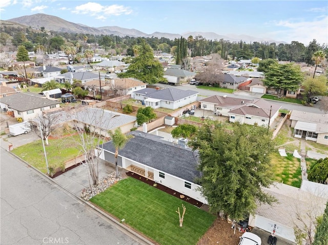 bird's eye view featuring a residential view and a mountain view