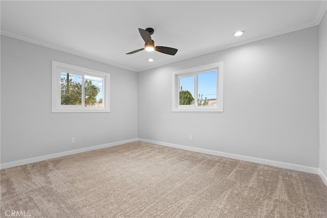 empty room with recessed lighting, plenty of natural light, carpet flooring, and baseboards