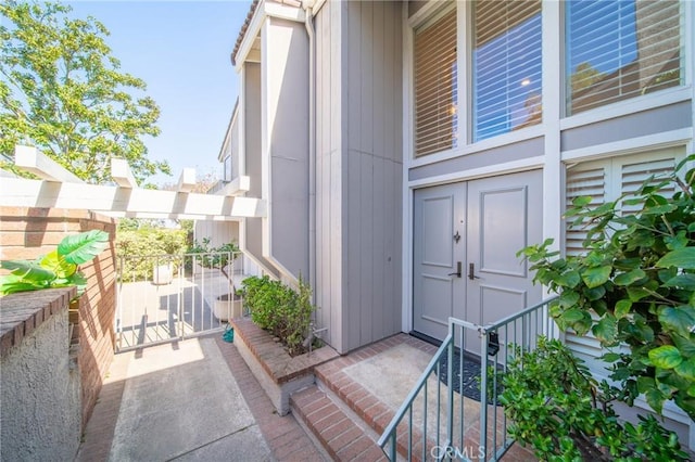 doorway to property featuring a balcony