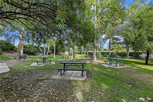 view of home's community featuring a lawn