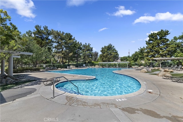 pool featuring a patio area