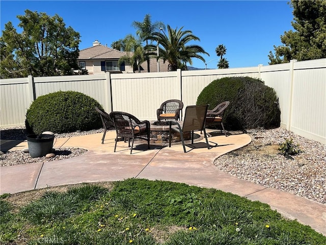 view of patio with a fenced backyard