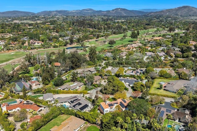 birds eye view of property with a residential view and a mountain view