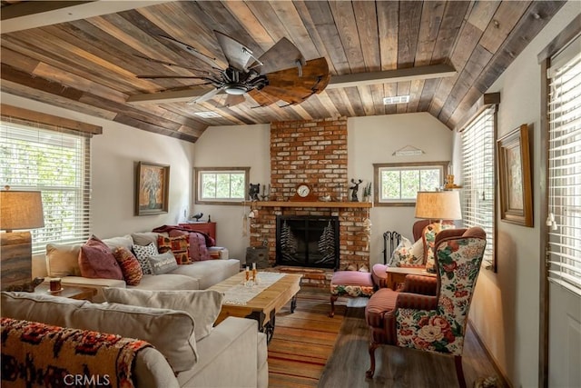 living room with a ceiling fan, lofted ceiling, wooden ceiling, and a fireplace