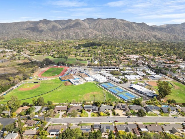 birds eye view of property with a residential view and a mountain view