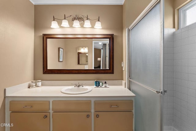 full bathroom with a shower stall and vanity