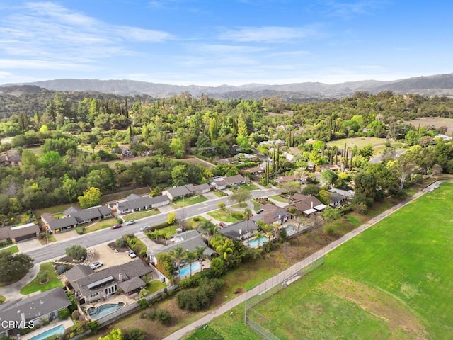 bird's eye view featuring a residential view and a mountain view