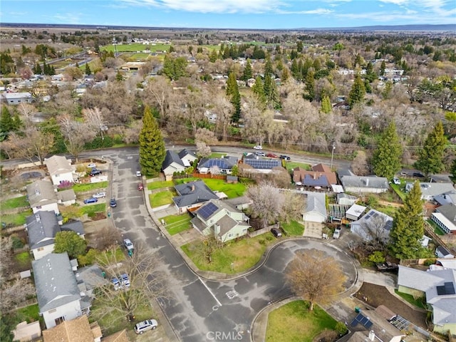 birds eye view of property with a residential view