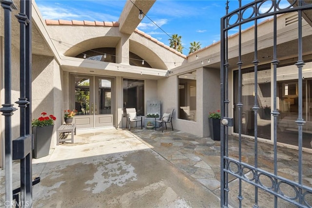 view of patio featuring french doors