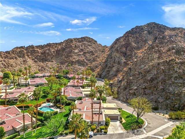 drone / aerial view featuring a mountain view and a residential view