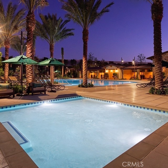 pool with a patio area