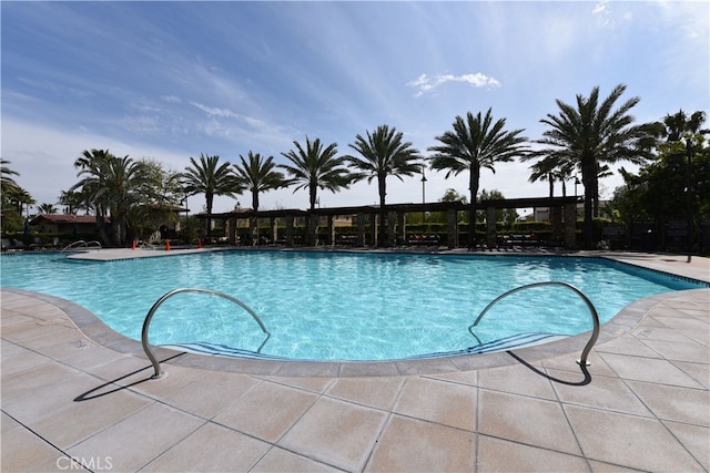 pool with a patio area