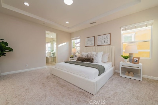 bedroom with baseboards, visible vents, a raised ceiling, carpet flooring, and recessed lighting