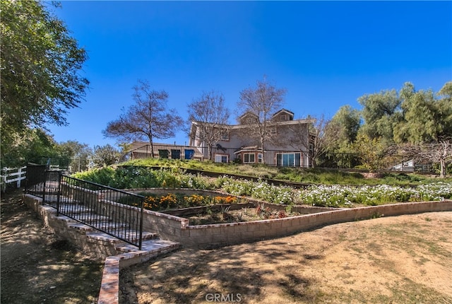 6 Bronco Ln, Bell Canyon, CA 91307 - exterior space with fence and a garden