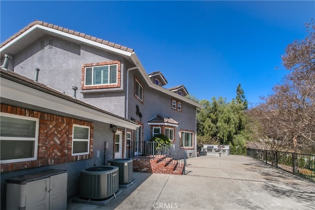 6 Bronco Ln, Bell Canyon, CA 91307 - rear view of property featuring a patio, fence, stucco siding, and cooling unit