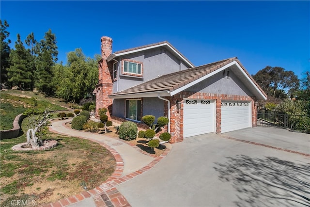 6 Bronco Ln, Bell Canyon, CA 91307 - view of property exterior with a garage, a chimney, aphalt driveway, stucco siding, and fence