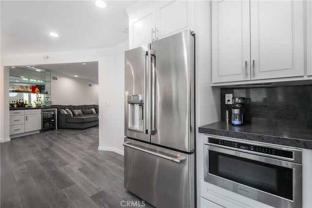 6 Bronco Ln, Bell Canyon, CA 91307 - kitchen featuring dark wood-style floors, high end refrigerator, dark countertops, white cabinets, and beverage cooler