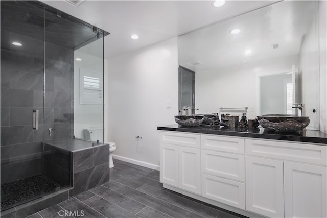 6 Bronco Ln, Bell Canyon, CA 91307 - full bathroom featuring recessed lighting, wood finished floors, a shower stall, toilet, and vanity