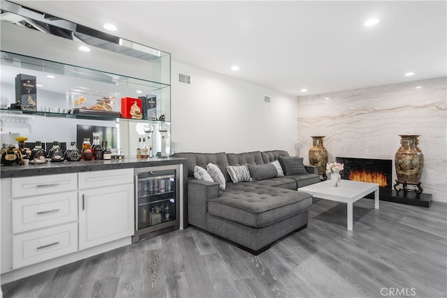 6 Bronco Ln, Bell Canyon, CA 91307 - living room featuring visible vents, wine cooler, a dry bar, recessed lighting, and wood finished floors