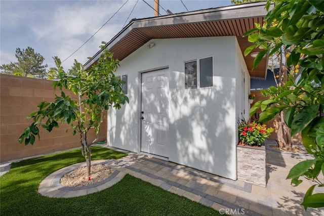 view of outdoor structure with fence private yard